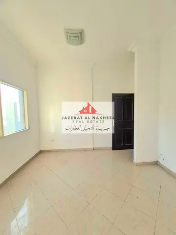 A two-bedroom apartment is available in Al Tawoon.
