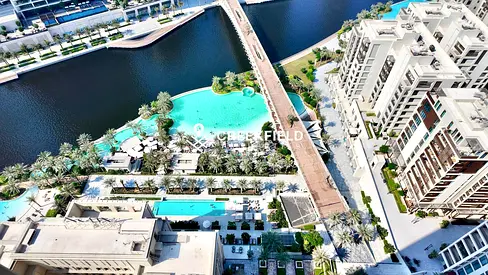 Here's a polished, professional property description: VIDA Creek Beach | Premium 2BR | BreathtakCre