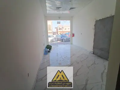 محل تجاري مميز بمساحة كبيرة للإيجار السنوي | المويهات 3 عجمان موقع استراتيجي حيوي يناسب مختلف الأنشطة التجارية والخدمية  | حمام خاص وتسهيلات في السدا