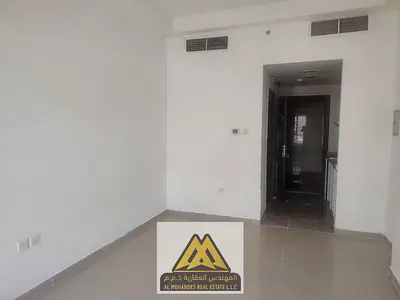 A unique investment and residential opportunity: a semi-detached studio apartment with a kitchen for sale in Al Rashidiya, Pearl Towers.