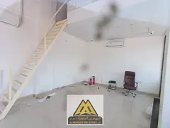Commercial space with a mezzanine in a prime location suitable for various businesses, with flexible