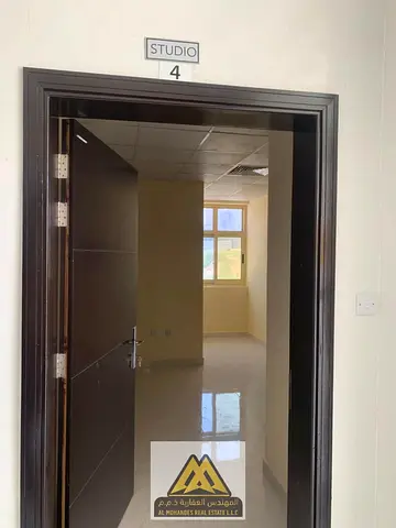 A modern studio apartment for annual rent in Al Alia, Ajman. The property features a practical design, comfortable space, and high-quality finishing,