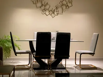 Modern glass dining table with 6 upholstered cantilever chairs