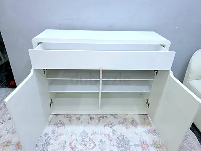 Modern White Storage Cabinet with Shelves and Drawer