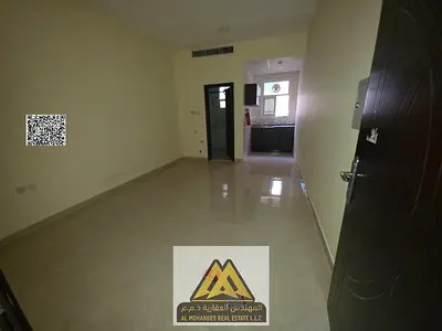 Spacious studio apartment for rent in Al Jurf 2, Ajman | Semi-separate kitchen | Central air conditioning | Near Al Aqsa School | 20,000 AED