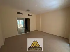 Two-bedroom apartment for annual rent in Al Nuaimiya 2, Ajman. Features separate hall, balcony, 2 ba