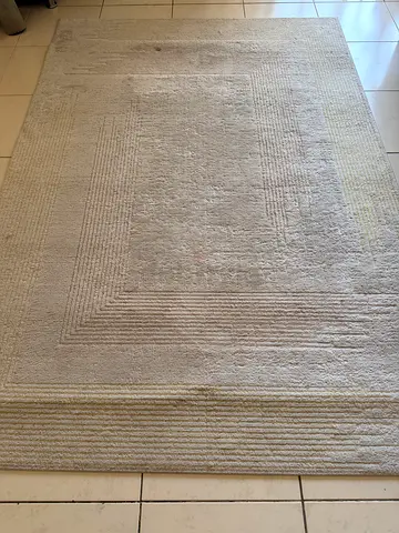Beige textured area carpet - 160x200 cm, good condition