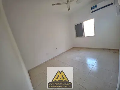 1-bedroom apartment with separate living room in Al Nuaimiya 2, split AC, good space, prime location, AED 24,000 yearly, payable in 4 installments.