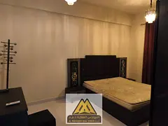 One-bedroom apartment with a living room and balcony in the Liwara area, near Diwan Tower, close to