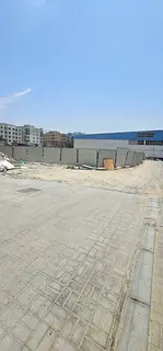 Commercial land for sale in Al-Jarf 2 area, second plot from Mohammed Azim roundabout. Land area 833