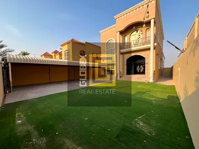 فيلا للإيجار في المويهات 1 | 5 غرف وصالة ومجلس مع روف وموقع قريب من مخرج دبي