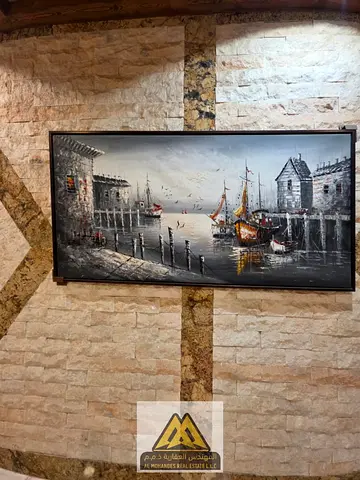 استوديو ملكي فاخر للإيجار السنوي (واحد من أفخم استوديوهات عجمان) مع مطبخ منفصل وبلكونة وتكييف مركزي في الروضة 3 على شارع الخرطوم مباشرة