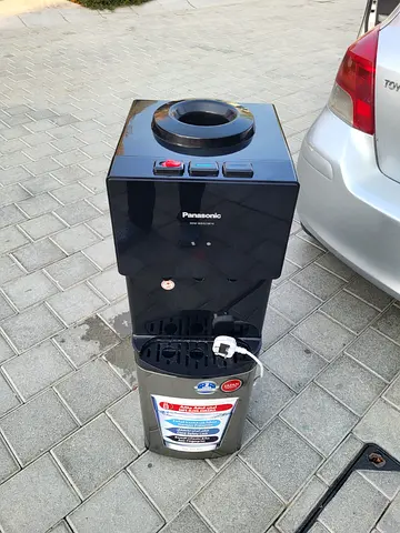 Top load water dispenser