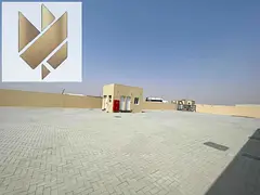 Industrial Yard for Rent in Al Sajaa, Sharjah | 20,000 Sq. Ft. | Main Road | 30kW Power | Interlock