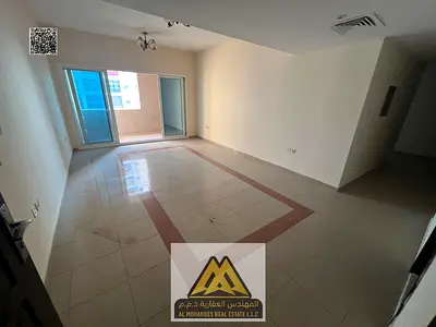 3BR hall in Al Rashidiya 3, Ajman, 3 bathrooms, master, balcony, wardrobes, near Corniche, AED 55k, 4 payments.