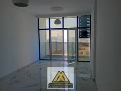 Luxury apartment for rent in Mushairif, Ajman. Master bedroom and living room, new tower, sea view b