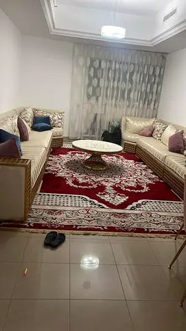 Classic red Persian-style rug in excellent condition