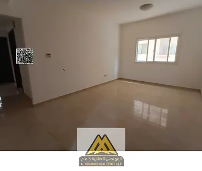 Spacious 1-bedroom apartment in Al Jurf 2, balcony, near university and Delta Center. AED 28,000 yearly, 4 payments, prime location.