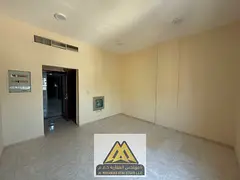Annual rental: Spacious studio in Al Rashidiya 2 – Ajman, featuring a large area, semi-separate ki