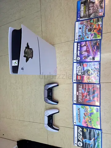 PlayStation 5 with 2 controller and 7 games