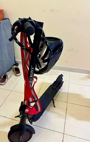 Used Crony Electric Scooter with Helmet - Good Condition