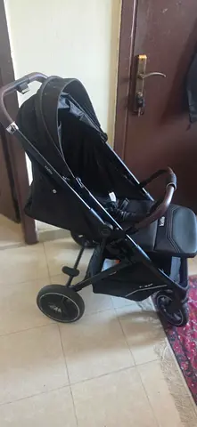 Lightweight black stroller in excellent condition, compact fold, kidilo