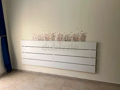 Modern White Slatted Wall Mounted Headboard
