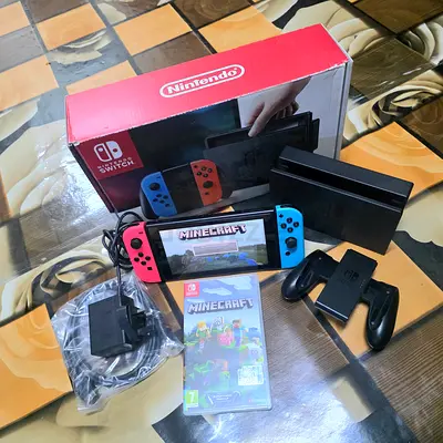 NINTENDO SWITCH +1 GAMES WITH BOX