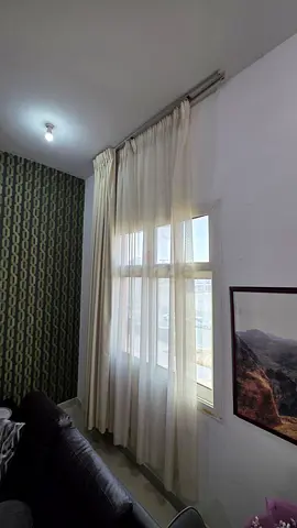 Off white sheer curtains with blackout drapes and ceiling fixing brackets - gently used