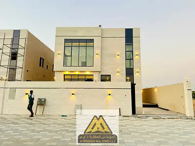 For sale without registration fees luxurious villa with super deluxe finishes featuring 4 master bedrooms located in Al Zahia close to all services