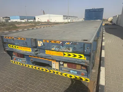 Flat bed trailer with Angal jali