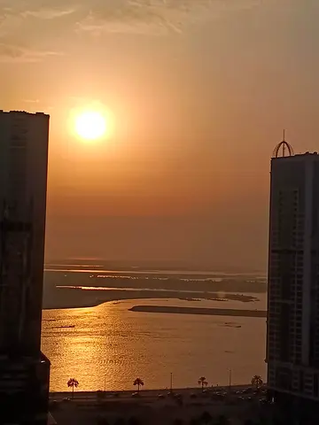 Direct Al Khan & Al Mamzar lake view. 3 master bedrooms, gym, pool, kids area, parking and central AC in a modern Al Taawun tower.