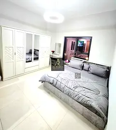 Fully furnished studio with a gym, pool, and parking; conveniently located for easy access to Dubai