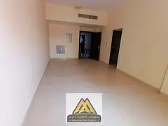 Two-bedroom apartment for annual rent in Al Jurf Industrial 3, Ajman. Excellent finishing, 2 bathroo
