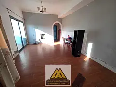 Studio apartment for annual rent | Al Nuaimiya 1 | Excellent size | On the Dubai and Sharjah exit