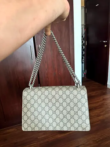 Gucci Dionysus Shoulder Bag in GG Supreme canvas with black suede trim.