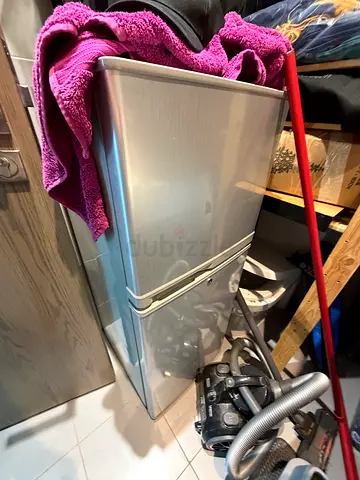 Silver double-door refrigerator - good working condition