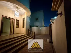Corner villa for rent in Al Rawda 3, Ajman. 5 master bedrooms, majlis, living room, two kitchens, ro