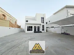 Annual rent: Brand-new villa in Al Rawda 2, residential or commercial use, 4 master bedrooms, majlis
