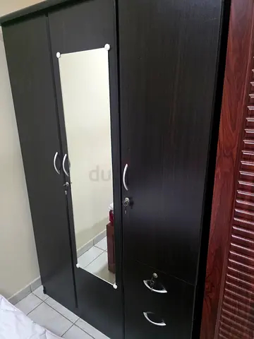 3-door dark wood wardrobe with full-length mirror, good condition