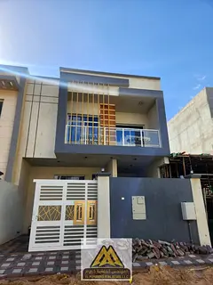 A family villa with a modern design, spacious areas with balconies, a quiet residential location, an