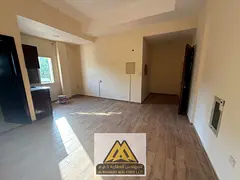 Spacious Studio in a Modern Building Prime Location Near All Services with Easy Access to Dubai and