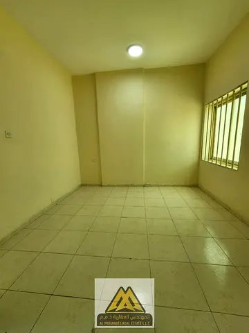 Two bedrooms and a living room\ spacious\ with a balcony\ central air conditioning\ and maintenance included\ Easy access to Sharjah and Dubai.