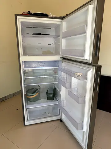 Used top-freezer refrigerator - good working condition