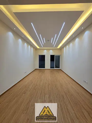 Spacious one-bedroom apartment in Ajman One Towers, Al Rashidiya 3, with 1300 sq ft area, master bedroom, 2 bathrooms, large balcony, park view, and f