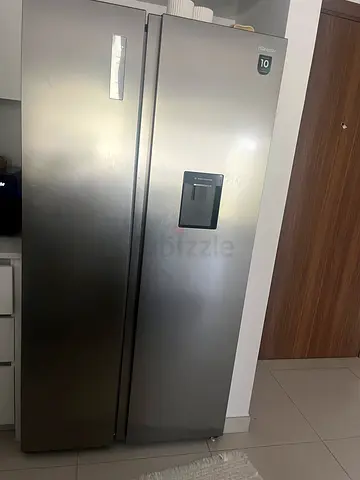 Hisense side by side fridge/freezer. 1 year old