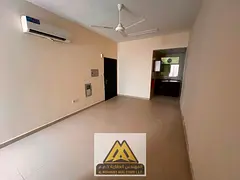 Studio for annual rent in Al Rawda 3, Ajman, ground floor, excellent space, semi-separate kitchen, s