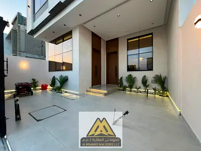 Luxury townhouse villa for sale in Al Zahia, 4 bedrooms, majlis, living room, office, roof, 3,200 sq. ft. built-up area. Price: AED 1,350,000.