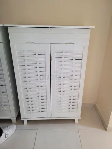 White wooden storage cabinet with louvered doors - good condition