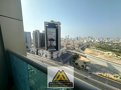 Two bedrooms and a living room with a balcony overlooking the Grand Mall and the Sheikh's Palace, next to all services in City Tower Al Nuaimiya 3